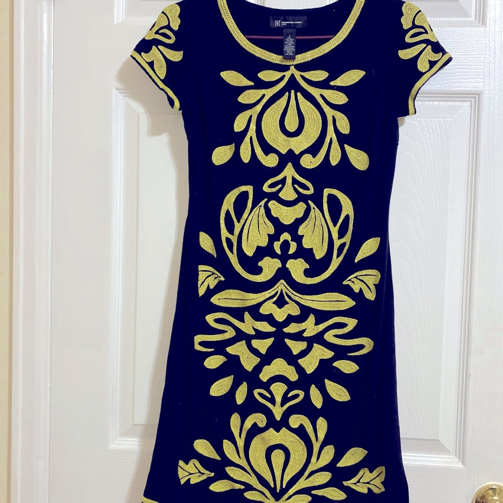 women’s dress navy with lime green embroidery. Beautiful eye catching.